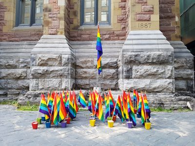 A memorial in solidarity with the victims of the Pulse nightclub shooting in Orlando in front of Montreal's St. James United Church.
