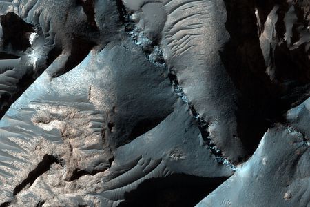 Image of the cliffs at Terra Sabaea on Mars. The description was recently translated into Icelandic and posted to the Beautiful Mars Iceland Tumblr. 