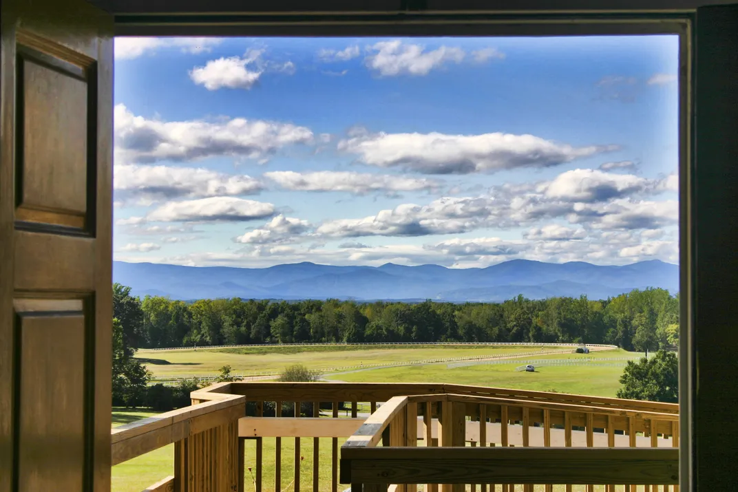 A view from James Madison's home at Montpelier offers a picturesque look at lush greenery and majestic mountains.