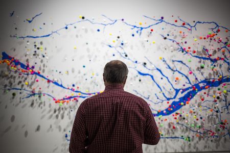 Artist Suzan Shutan assembled her map of the rivers and groundwater wells of Nebraska by projecting the data on the gallery's wall.
