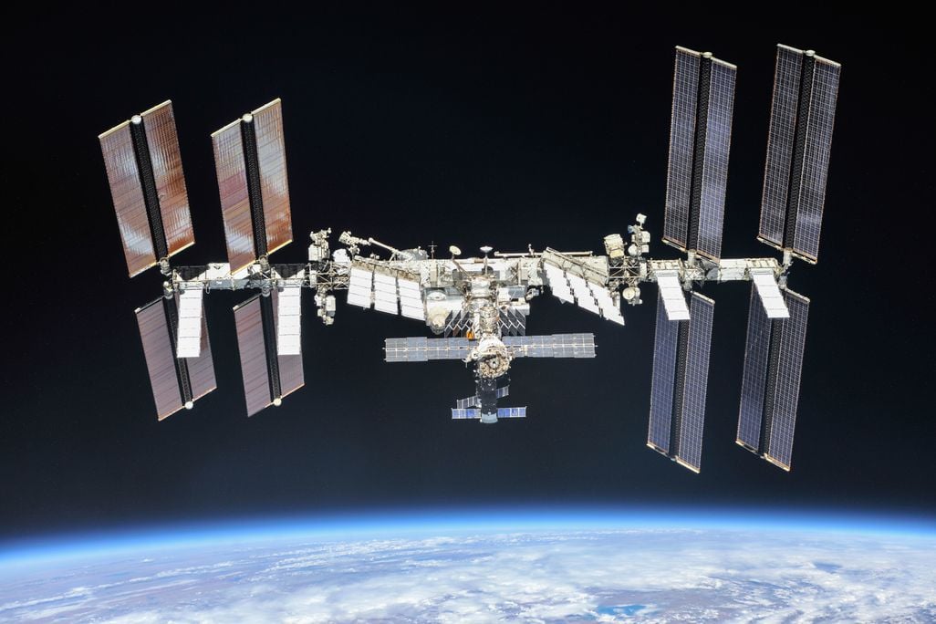 Image of the International Space Station photographed by Expedition 56 crew members on Oct. 4, 2018 above the horizon of Earth