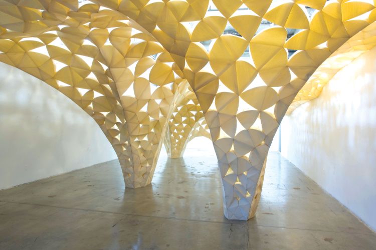 IwamotoScott, Voussoir Cloud, SCIArc Gallery (Los Angeles, California, 2008). PHOTO Judson Terry.

In IwamotoScott Architecture's 2008 installation Voussoir Cloud, heavy wood blocks become translucent petals depending on the changing light of day. The firm won the 2019 National Design Award for Interior Design.