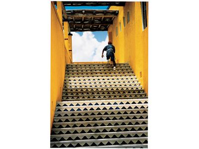 GRAND PRIZE WINNER
Puerto Vallerta, Mexico &bull; Photographed July 2003
"Just as I snapped the shutter," says Williams, a trumpet player, "this kid ran into the picture.... Wow! I knew I had something very special. It was almost spiritual like going up a stairway to heaven."
