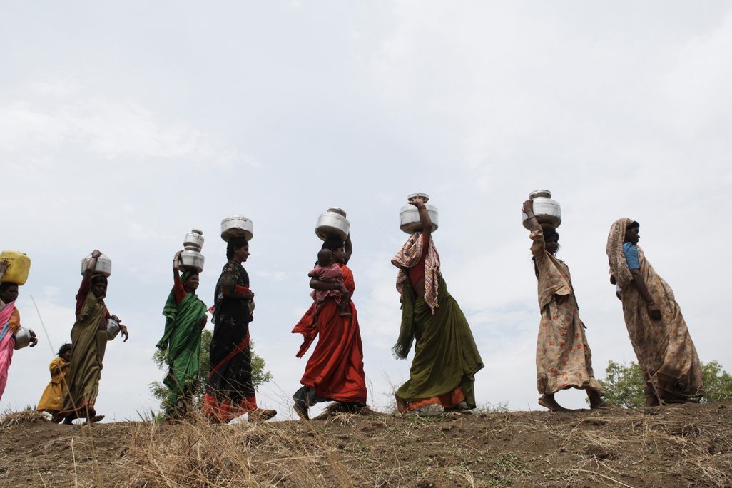Women Carrying Water