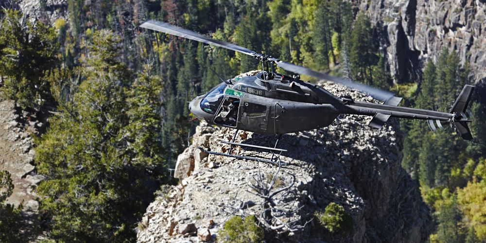 Helicopter Mountain flying billboard.jpg