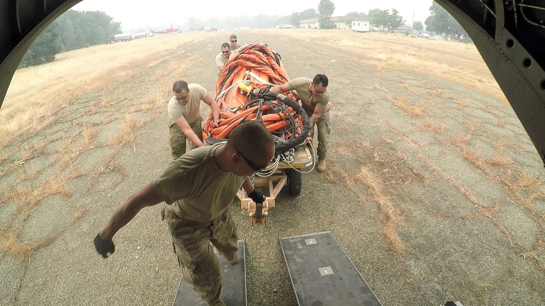 Army National Guard loads water