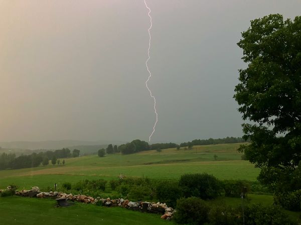 A bolt of lightning during a summer storm. thumbnail