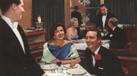 Dining aboard the RMS Caronia, from a 1950s World Cruise brochure.