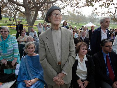 Holocaust survivor and artist Kalman Aron, third from left, stands as he is recognized with fellow survivors, as community leaders attend the opening of the Los Angeles Museum of the Holocaust (LAMH) at the Pan Pacific Park on Thursday, Oct. 14, 2010, in Los Angeles