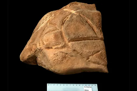 The carved boulder, which weighs about 60 pounds and measures less than a foot across, &ldquo;may have represented a totem or a mythological or spiritual figure,&rdquo; says archaeologist Omry Barzilai.