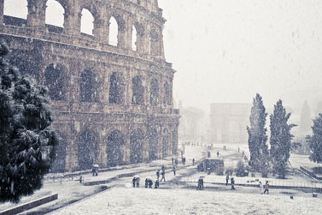 A freakishly cold winter coated Rome's Colosseum in snow