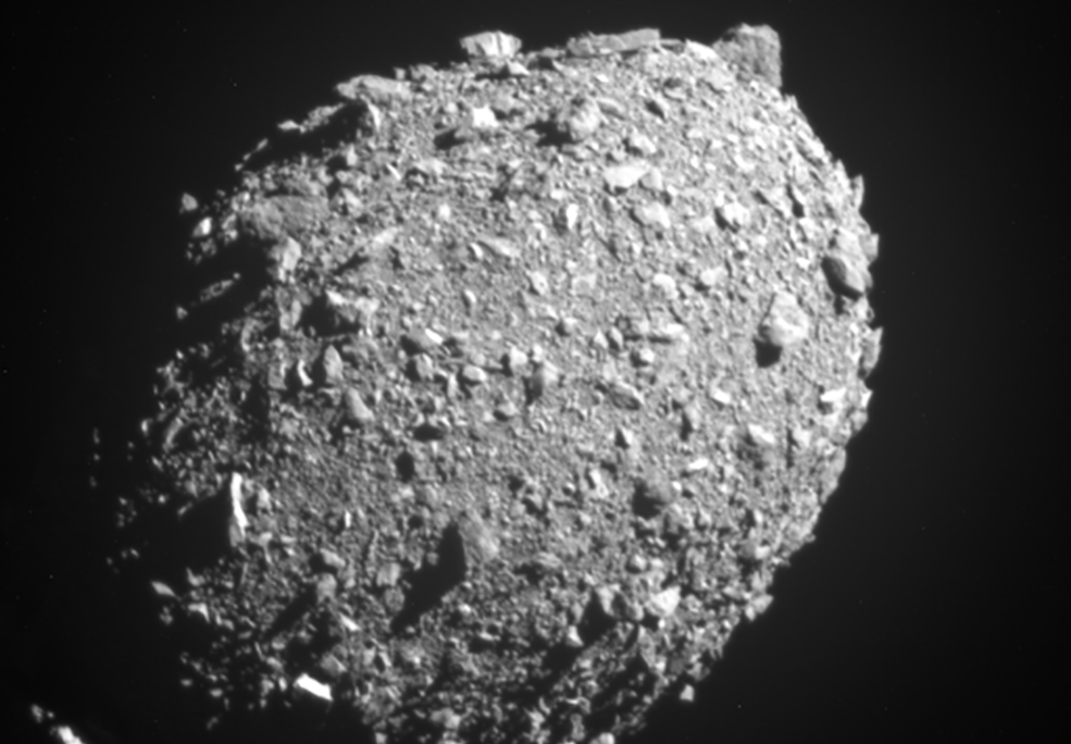 a space rock with lots of little boulders on it