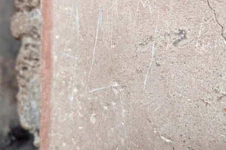 &nbsp;A Kazakh tourist etched the letters &quot;ALI&quot; into a wall at Pompeii&#39;s House of Ceii.