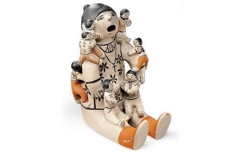 See Helen Cordero's Storyteller figure is among the works in the "Small Spirits" exhibit at the American Indian Museum's Heye Center in New York until February 19, 2012.