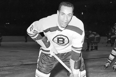 Boston Bruins forward Willie O'Ree warms up prior to a game against the New York Rangers in 1960.