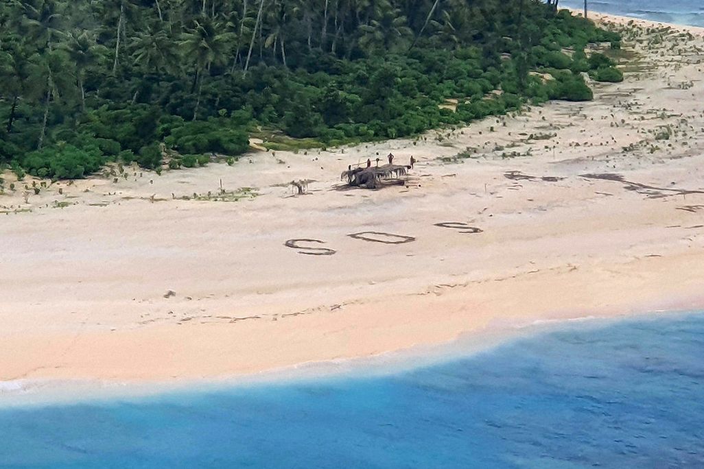 SOS sign on island