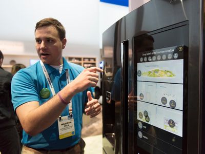 Madison Hill of Samsung demonstrates a Family Hub Refrigerator at the 2016 Consumer Electronics Show in Las Vegas.