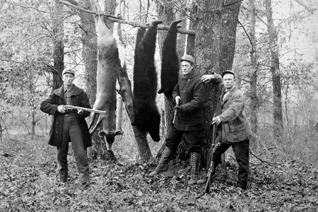 Hunters in 1910 pose with their new bear arms