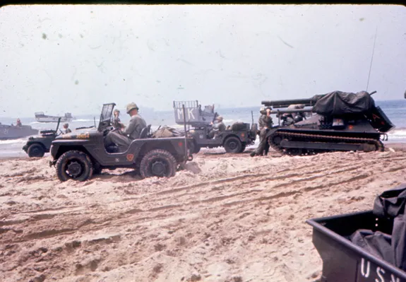“Jeeps and tanks on the beach ready to ‘attack.’”