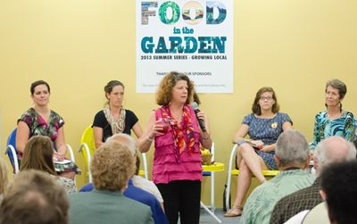 The panel at Food in the Garden’s August 1 event prepares to delve into the issues surrounding community garden and food education.