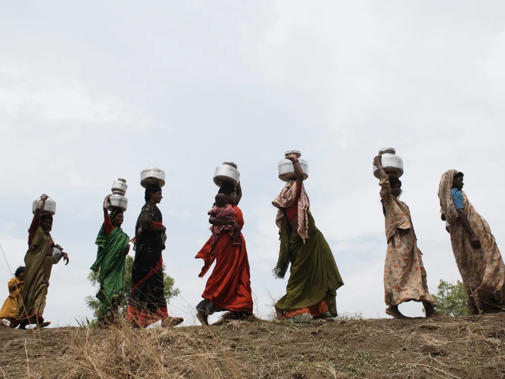 Women Carrying Water