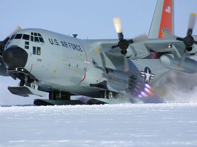 An LC-130 of the New York Air National Guard's 109th Airlift Wing gets a jet-assisted takeoff from Camp Summit, Greenland, in 2011. 