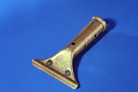 Window washer Jan Demczur used his squeegee to pry open the elevator doors where he and five others were trapped. Taking turns, they used the squeegee and its metal handle to hack through drywall so that they could squeeze through and escape down the stairs.