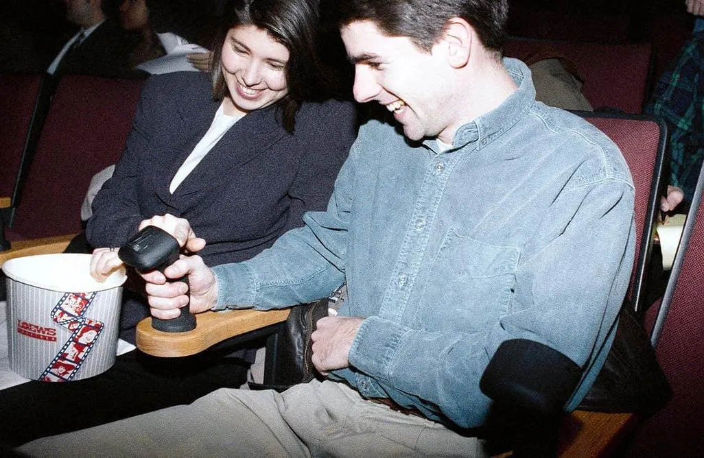 Moviegoers familiarize themselves