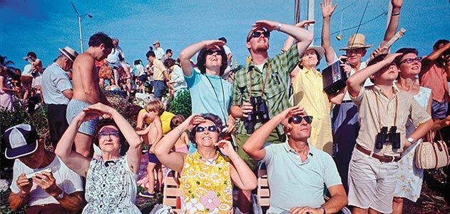Crowd looking at Apollo 11 launch