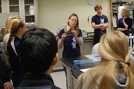 Technician Maggie Halloran explains to a group of high school students how DNA sequencing works at the National Museum of Natural History’s new Laboratories of Analytical Biology (LAB), a molecular biotechnology hub.