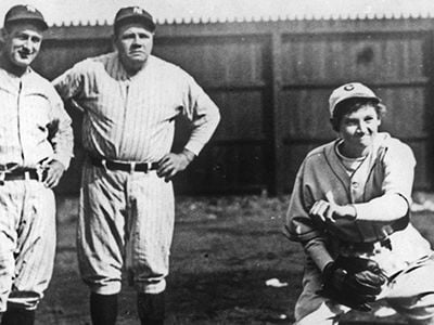 Days after Jackie Mitchell (center) struck out Yankee superstars (from left) Lou Gehrig and Babe Ruth, the duo watched the female phenom demonstrate her fastball during spring training in Chattanooga, Tennessee, on April 4, 1931.