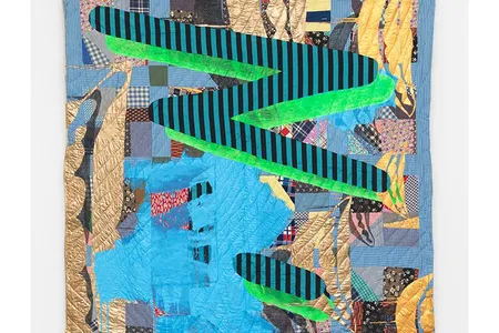 Chorus for Paul Mooney, 2017, made of antique quilt, assorted textiles, acrylic and spray paint. Most of the quilts used in Biggers’ works were donated or came from thrift stores. 