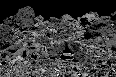 The surface of the asteroid Bennu, as seen in close-up by the Osiris-Rex spacecraft. Boulders this size (the largest, at upper left, is 48 feet wide) pose a danger to the touch-and-go mission.