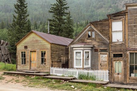 Abandoned wooden houses line the main street in St. Elmo, Colorado. 