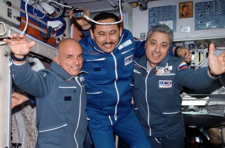 American space tourist Dennis Tito (right) with Russian cosmonauts