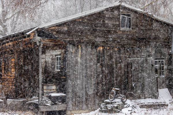 Barn & Tricycle in snow storm thumbnail