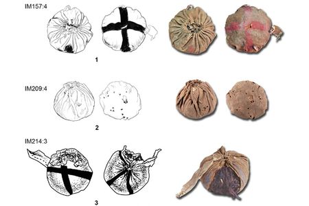 Three 3,000-year-old balls discovered at the Yanghai cemetery complex in Xinjiang