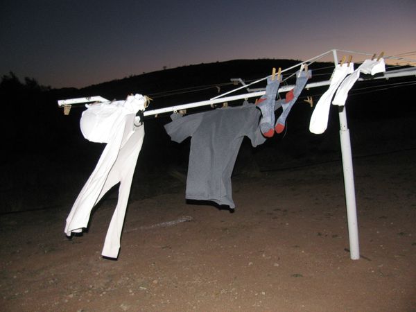 Laundry coming alive in an African wind; Photo by Ralph Gallay, Ph.D. thumbnail