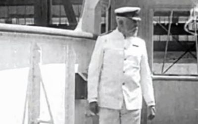 Captain Edward Smith purportedly on the Titanic, but actually filmed a year earlier aboard the Olympic.
