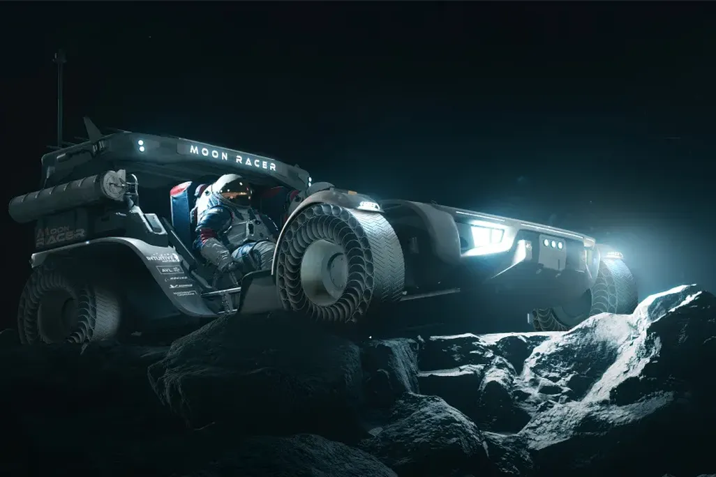An artist's concept of Intuitive Machines' moon buggy, featuring a fully suited astronaut sitting in the driver's seat