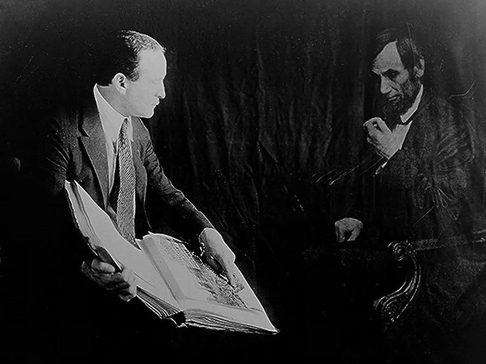 Houdini photographed with the "ghost" of Abraham Lincoln