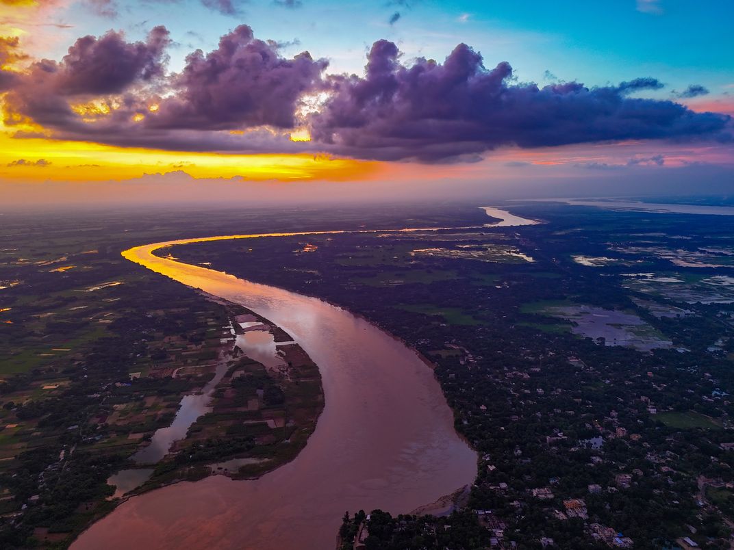 River glowing under a burning sunset | Smithsonian Photo …