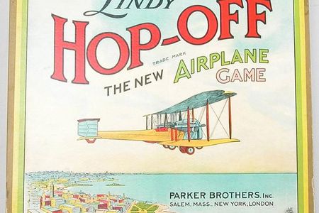 This Parker Brothers game features a Vickers Vimy on the "Lindy" game box and board—the aircraft in which British aviators John Alcock and Arthur Brown made their non-stop transatlantic flight in 1919. Perhaps a similar game existed before Lindbergh's solo flight in his Ryan monoplane. 
