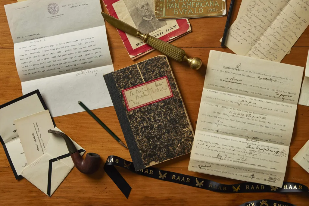 Papers, notebook and other artifacts on a table