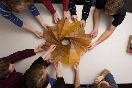 One of Brigham Young University engineering professor Larry Howell's initial origami projects was a solar array that compacted to 9 feet during launch, but deployed to 82 feet across in space to generate power.