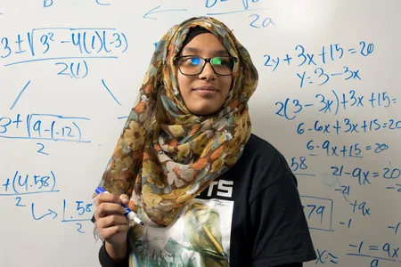 The focus on achievement and social justice is transformative, says Sumaiya Sabnam, at work on equations. “I call myself a student activist,” she says. 