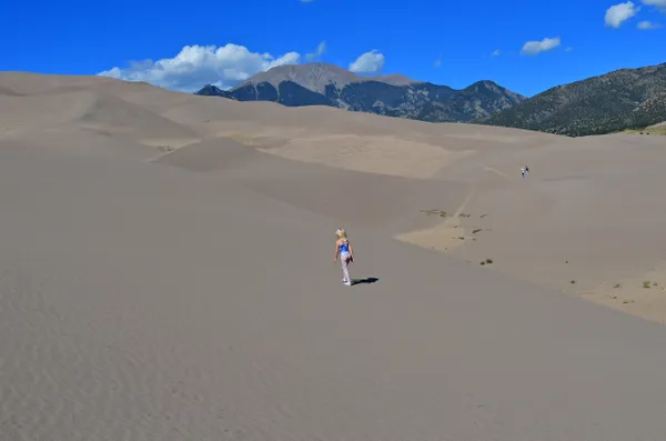 Girl exploring in Great Sand Dunes National Park thumbnail