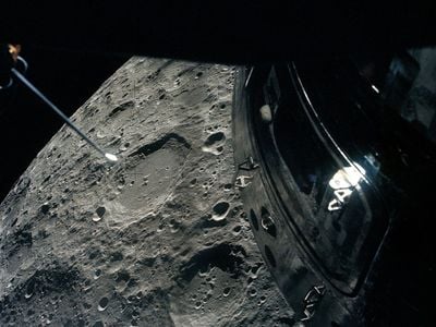 Apollo 13 passing the Moon.