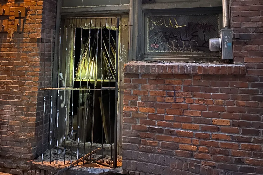 Damaged brick building