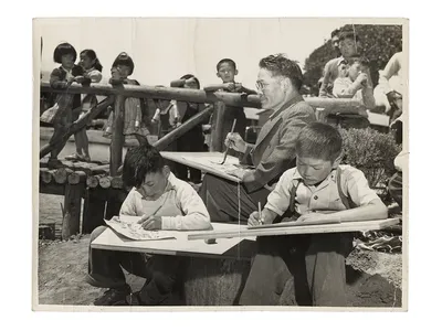 Photograph of Chiura Obata teaching a children's art class at Tanforan Art School, 1942 / unidentified photographer. Chiura Obata papers. Archives of American Art, Smithsonian Institution.